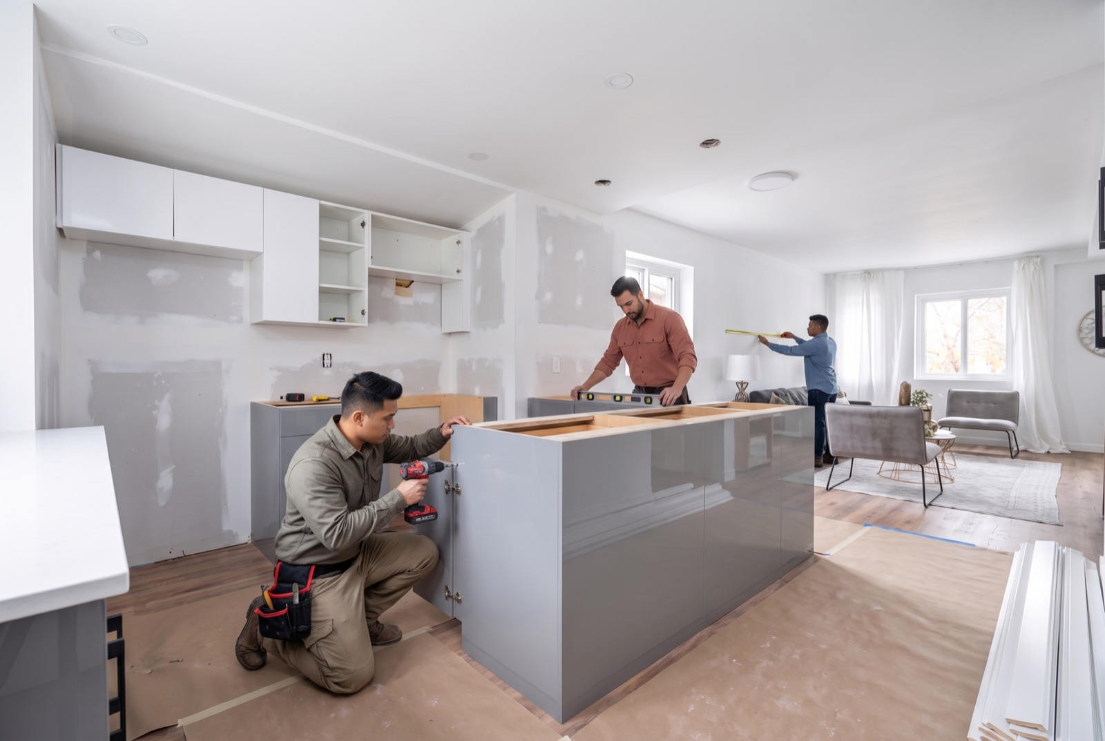 Illustration of a team renovating a kitchen in Chalmers, Winnipeg